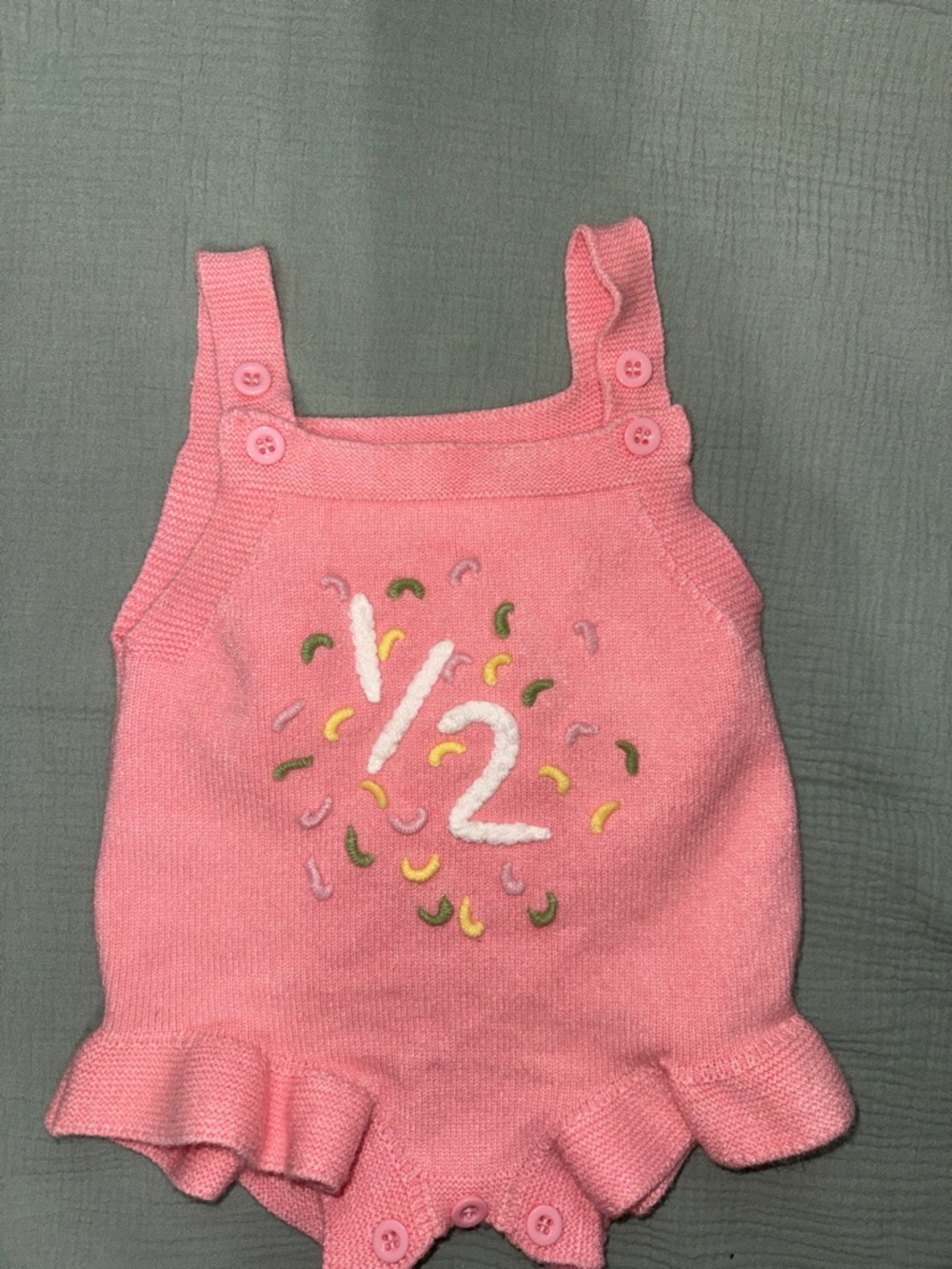 Pink Baby Knit Romper with Embroidered 1/2 Detail